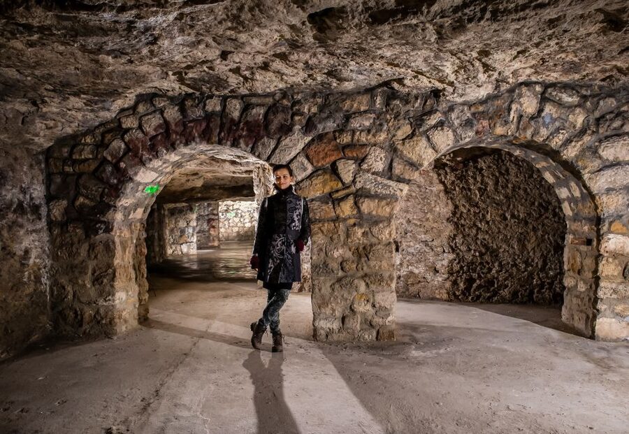 Budapest: Buda Castle Cave Tour - The human side: wine cellars, bomb shelters, and a medieval prison