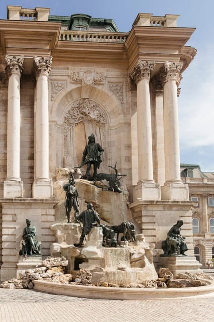Budapest: Buda Castle Walking Tour & Folk Music Performance - Matthias Church and Fisherman’s Bastion, where the details matter