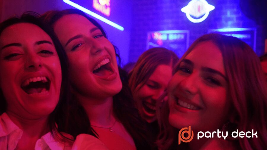 Budapest: Guided Tour to Ruin Bars with Games and 6 Shots - Stop one setup: welcome shots and fast group bonding