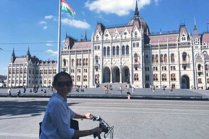 Budapest Highlights Bike Tour with a local guide - Szabadság tér and Budapest Parliament: big icons with short learning stops