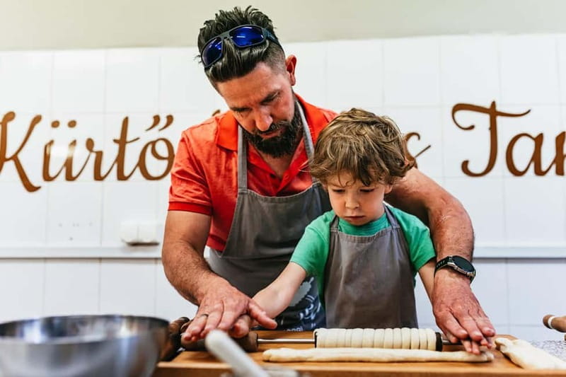 Budapest: Hungarian Chimney Cake Workshop in the City Center - The Big Payoff: Three Chimney Cakes, Toppings, and Taking Them Home