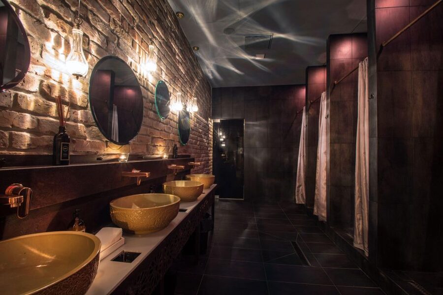 Budapest: Mandala Day Spa & Luxury Pool Experience - Relaxation area: heated marble bench, armchairs, and an actual reset