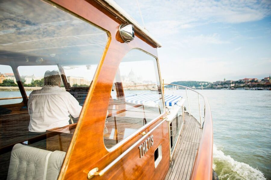 Budapest: Private Danube Yacht Cruise with Welcome Drink - Your crew and onboard atmosphere: captain plus English host